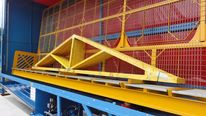 cabine d’aspersion pour le traitement des fermettes de charpente industrielle