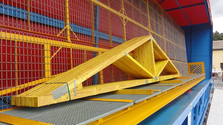 cabine d’aspersion pour le traitement des fermettes de charpente industrielle